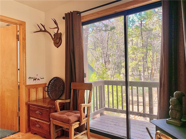 762 Esquimoux Dr, Green Valley Lake, CA 92341 - sitting room with plenty of natural light and wood finished floors