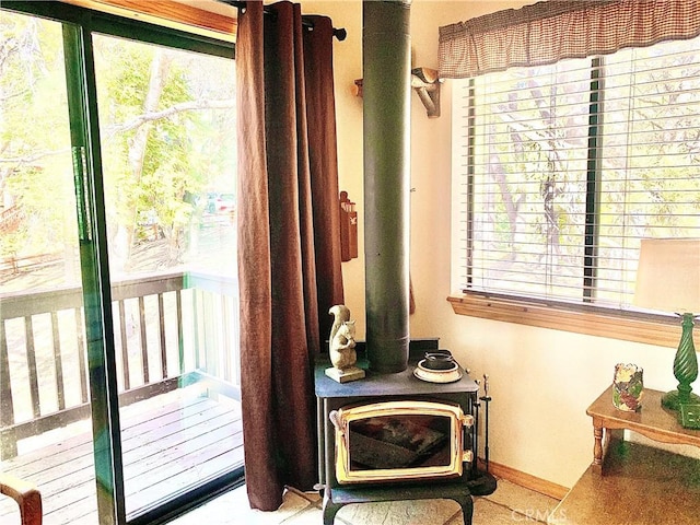762 Esquimoux Dr, Green Valley Lake, CA 92341 - doorway with a wood stove and tile patterned floors