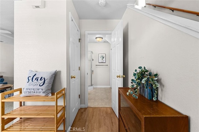 2099 Hartford Dr Unit 7, Chico, CA 95928 - corridor with light wood finished floors and baseboards