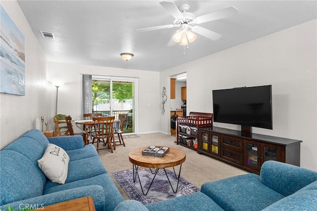 2099 Hartford Dr Unit 7, Chico, CA 95928 - living area featuring carpet, a ceiling fan, and baseboards