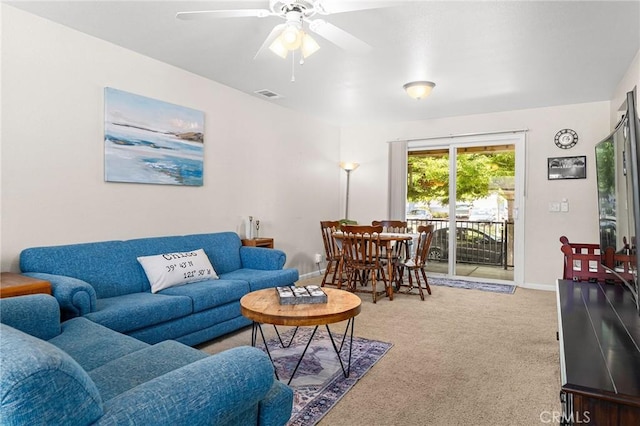 2099 Hartford Dr Unit 7, Chico, CA 95928 - carpeted living area with a ceiling fan and baseboards