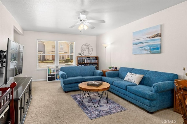 2099 Hartford Dr Unit 7, Chico, CA 95928 - living room featuring light carpet, ceiling fan, and baseboards