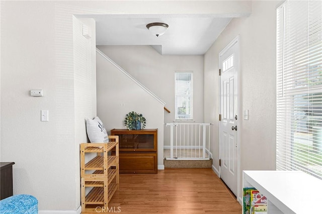 2099 Hartford Dr Unit 7, Chico, CA 95928 - entryway featuring stairway, light wood-type flooring, and baseboards