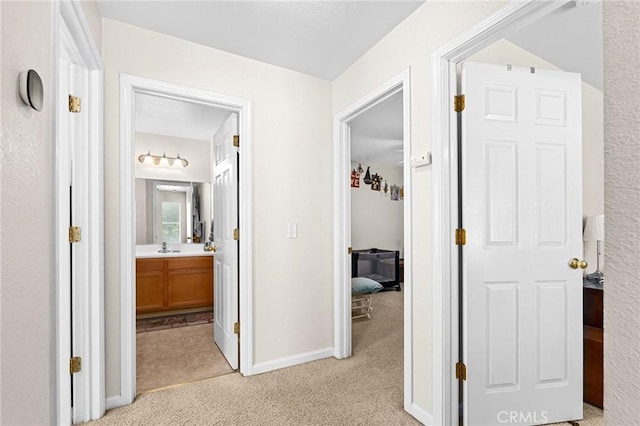 2099 Hartford Dr Unit 7, Chico, CA 95928 - hall featuring light carpet and baseboards