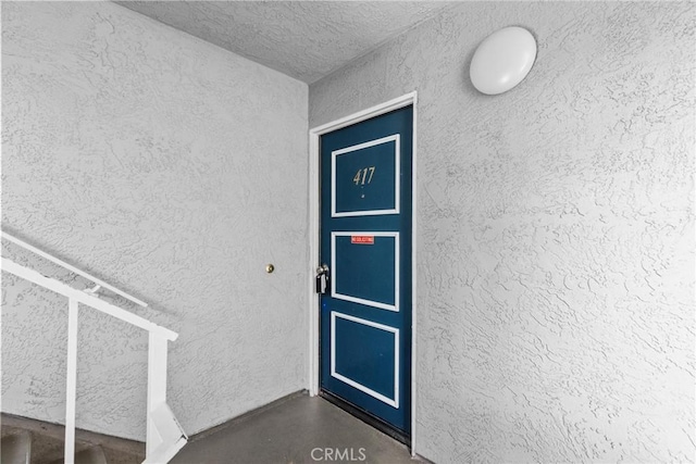 26762 Claudette St Unit 417, Canyon Country, CA 91351 - property entrance with stucco siding