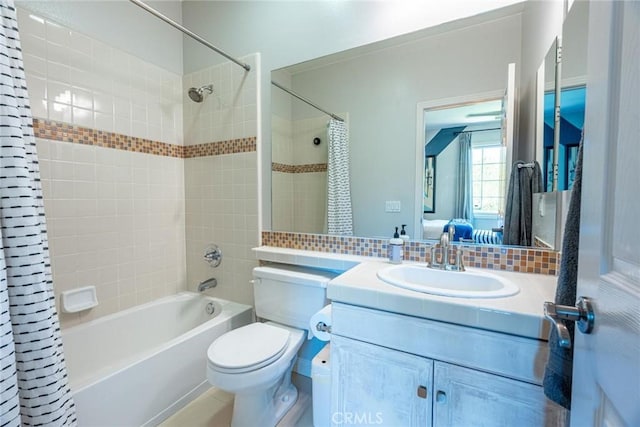 26941 Redwood Bluff Ln, Valencia, CA 91381 - bathroom featuring shower / bath combo, vanity, toilet, and backsplash