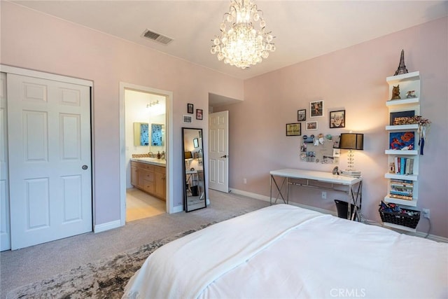 26941 Redwood Bluff Ln, Valencia, CA 91381 - bedroom with light carpet, a chandelier, baseboards, ensuite bathroom, and a sink