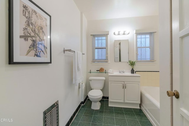 3349 Wood Ter, Los Angeles, CA 90027 - bathroom with vanity, tile patterned floors, toilet, a bathtub, and plenty of natural light