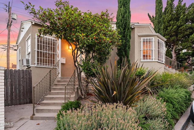 3349 Wood Ter, Los Angeles, CA 90027 - view of property hidden behind natural elements with stairway and stucco siding