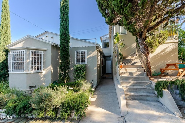 3349 Wood Ter, Los Angeles, CA 90027 - view of front of house with stairway and stucco siding