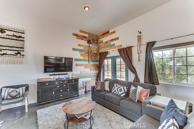 58725 Botkin Rd, Landers, CA 92285 - living room featuring baseboards, finished concrete floors, and recessed lighting