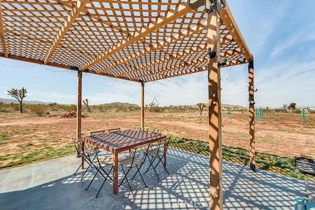 58725 Botkin Rd, Landers, CA 92285 - view of patio with a pergola and outdoor dining space