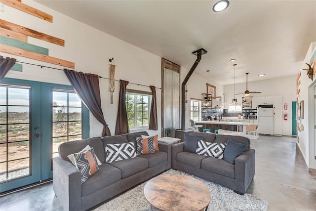 58725 Botkin Rd, Landers, CA 92285 - living room featuring finished concrete floors, french doors, recessed lighting, and a ceiling fan
