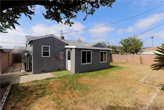 1023 W 186th St, Gardena, CA 90248 - back of property featuring stucco siding, crawl space, and a shingled roof