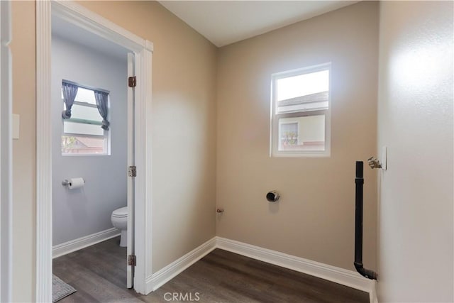 1023 W 186th St, Gardena, CA 90248 - laundry area with plenty of natural light, dark wood-type flooring, and baseboards