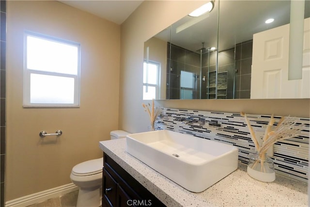 1023 W 186th St, Gardena, CA 90248 - bathroom featuring toilet, a shower stall, vanity, baseboards, and recessed lighting