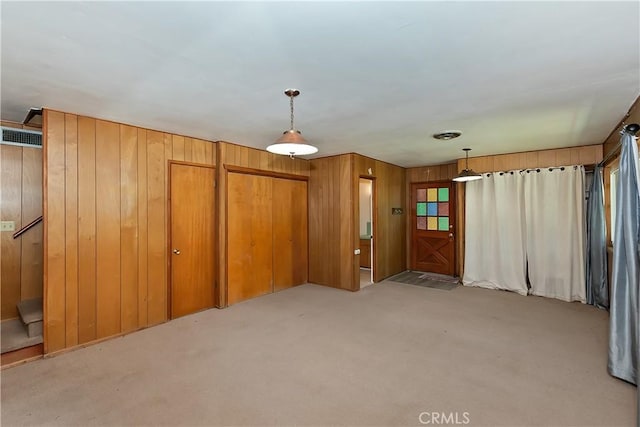 24141 Zell Ct, Crestline, CA 92325 - empty room with light carpet and wood walls