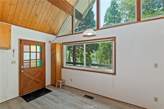24141 Zell Ct, Crestline, CA 92325 - entrance foyer featuring light wood-style floors, lofted ceiling, and baseboards