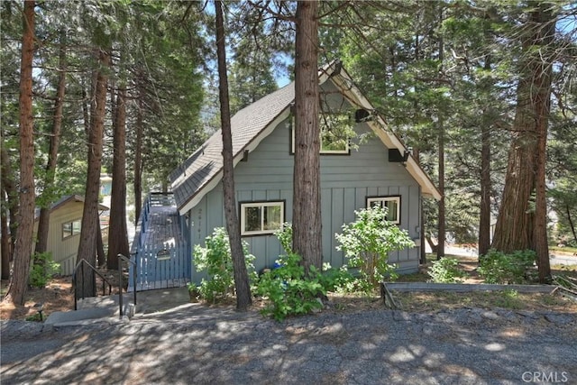 24141 Zell Ct, Crestline, CA 92325 - view of front of home featuring a gate and roof with shingles