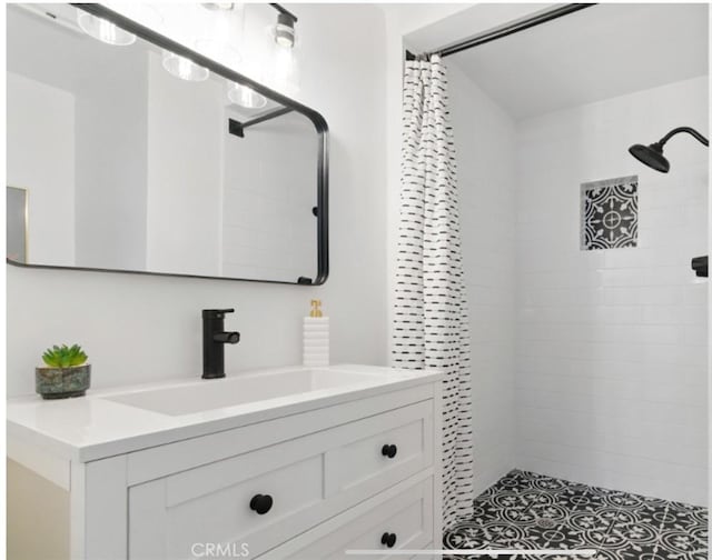 7686 Deer Trl, Yucca Valley, CA 92284 - full bathroom featuring vanity and a tile shower