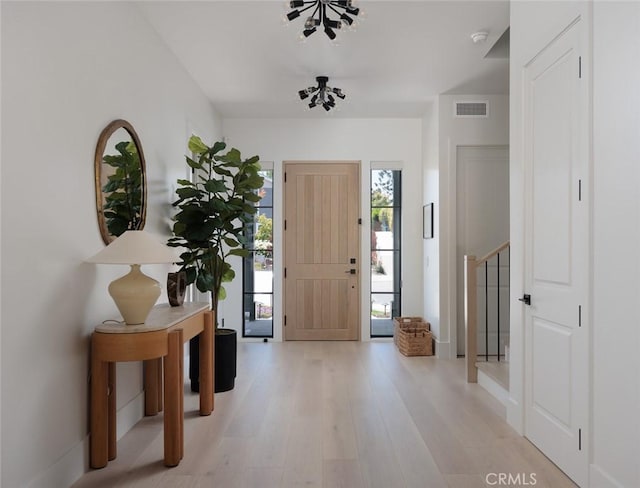 2780 James Dr, Carlsbad, CA 92008 - foyer entrance featuring light wood-type flooring