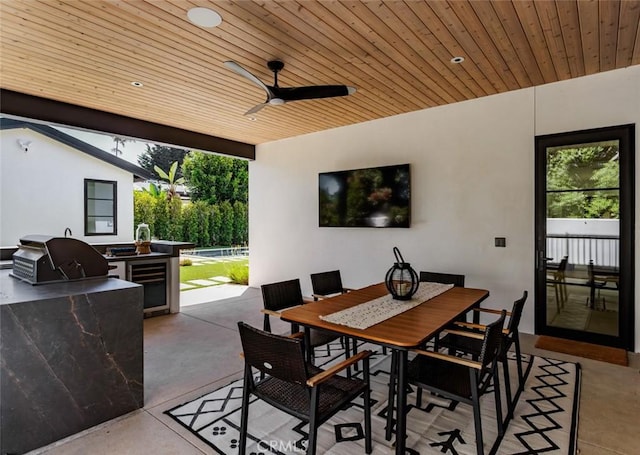 2780 James Dr, Carlsbad, CA 92008 - view of patio with wine cooler, ceiling fan, and outdoor dining area