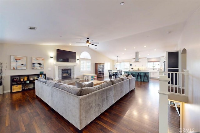 200 Cyclone St, Nipomo, CA 93444 - living room featuring ceiling fan, lofted ceiling, dark wood finished floors, a fireplace, and recessed lighting