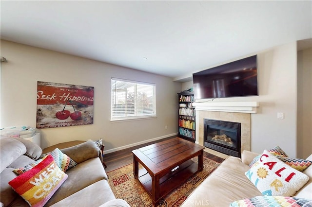 200 Cyclone St, Nipomo, CA 93444 - living room featuring a fireplace, wood finished floors, and baseboards