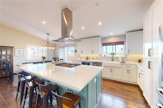 200 Cyclone St, Nipomo, CA 93444 - kitchen featuring island range hood, stainless steel appliances, healthy amount of natural light, a kitchen island, and lofted ceiling