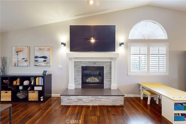 200 Cyclone St, Nipomo, CA 93444 - living area with vaulted ceiling, wood finished floors, a fireplace, and baseboards