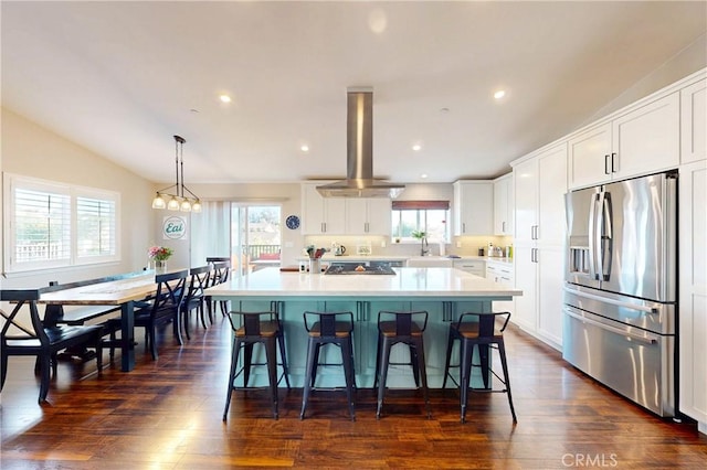 200 Cyclone St, Nipomo, CA 93444 - kitchen with stainless steel fridge with ice dispenser, island range hood, light countertops, white cabinetry, and a kitchen island
