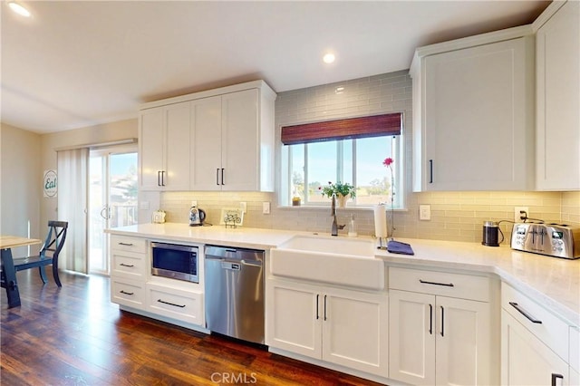 200 Cyclone St, Nipomo, CA 93444 - kitchen with stainless steel appliances, a sink, backsplash, white cabinets, and recessed lighting