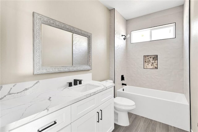 6693 Banyan Ave, Hesperia, CA 92345 - full bathroom with toilet, vanity, shower / tub combination, and wood finished floors