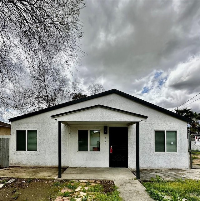 475 Transit Ave, Riverside, CA 92507 - view of front of home featuring stucco siding and a porch
