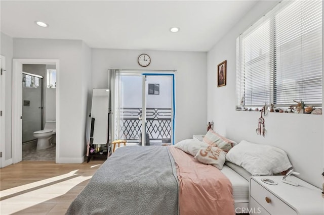 2806 Cudahy St, Huntington Park, CA 90255 - bedroom featuring access to outside, light wood finished floors, ensuite bathroom, recessed lighting, and baseboards