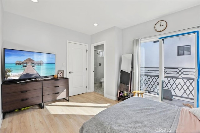 2806 Cudahy St, Huntington Park, CA 90255 - bedroom with light wood-type flooring, baseboards, recessed lighting, and ensuite bath