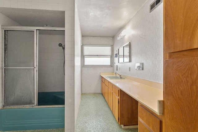13321 Prospect Ave, North Tustin, CA 92705 - bathroom featuring vanity and bath / shower combo with glass door