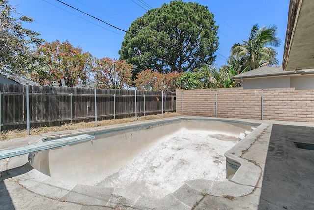 13321 Prospect Ave, North Tustin, CA 92705 - view of pool with a fenced backyard and a diving board