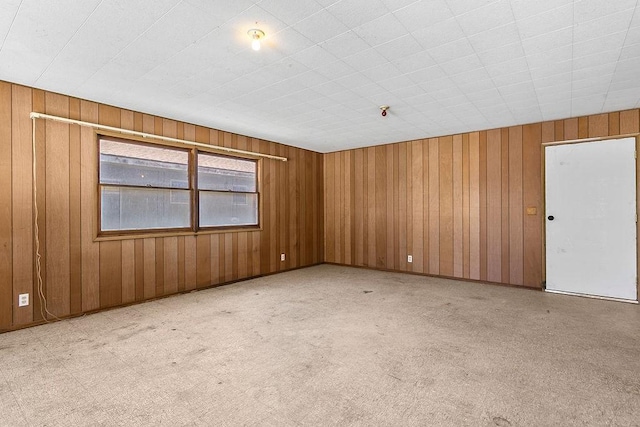 13321 Prospect Ave, North Tustin, CA 92705 - unfurnished room featuring wooden walls and a pendent fire sprinkler