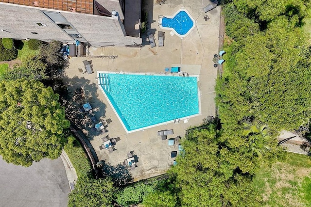 2564 Navarra Dr Unit 115, Carlsbad, CA 92009 - drone / aerial view of a pool