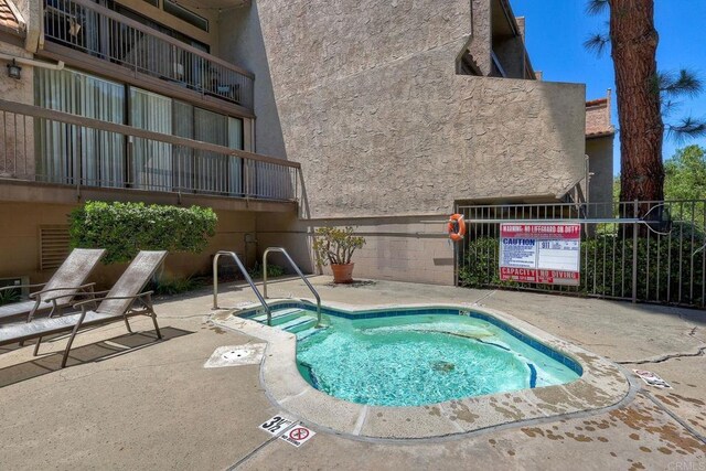 2564 Navarra Dr Unit 115, Carlsbad, CA 92009 - view of swimming pool with a patio