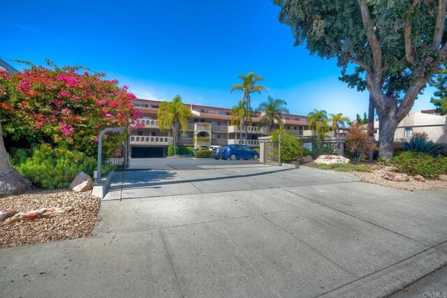 2564 Navarra Dr Unit 115, Carlsbad, CA 92009 - view of concrete surface with a gate