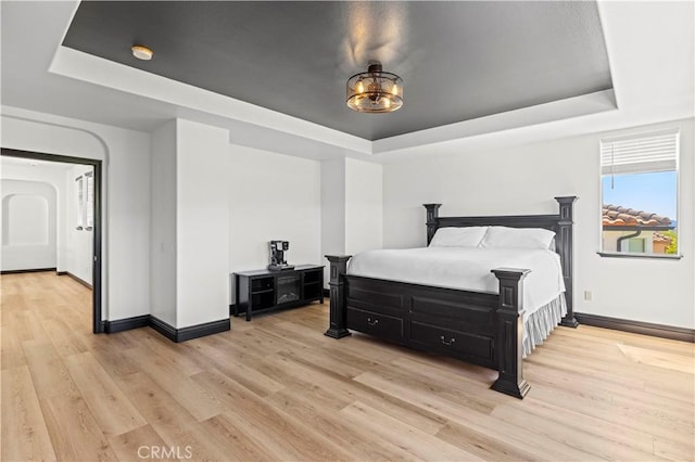 26556 Beecher Ln, Stevenson Ranch, CA 91381 - bedroom featuring a raised ceiling and baseboards