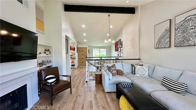 11467 Tampa Ave Unit 154, Porter Ranch, CA 91326 - living area with high vaulted ceiling, beamed ceiling, light wood-style flooring, a chandelier, and recessed lighting