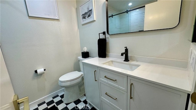11467 Tampa Ave Unit 154, Porter Ranch, CA 91326 - full bathroom featuring tile patterned floors, vanity, toilet, baseboards, and a shower