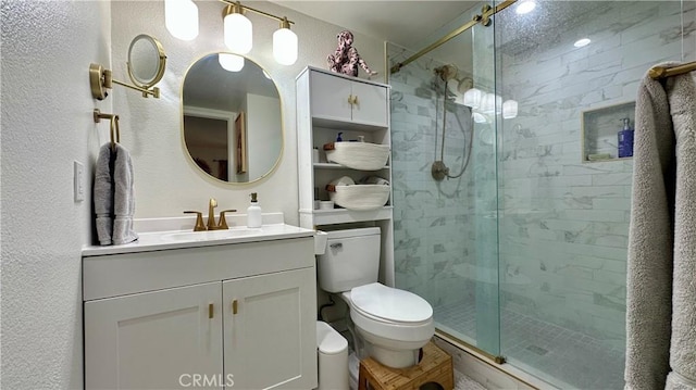 11467 Tampa Ave Unit 154, Porter Ranch, CA 91326 - bathroom with toilet, vanity, and a shower stall