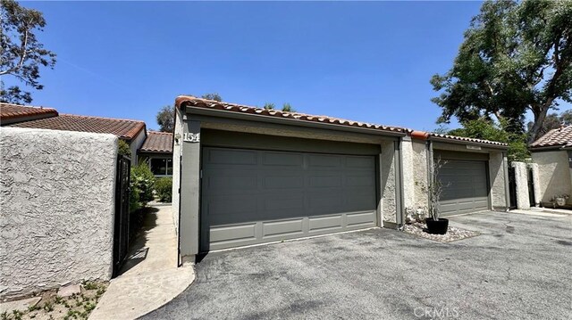 11467 Tampa Ave Unit 154, Porter Ranch, CA 91326 - view of garage