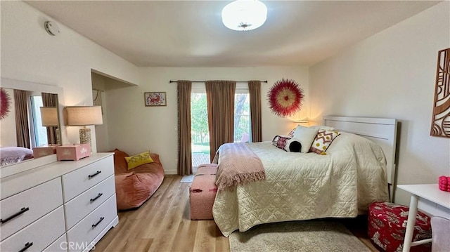 11467 Tampa Ave Unit 154, Porter Ranch, CA 91326 - bedroom featuring light wood-type flooring