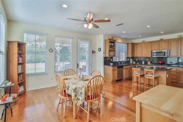 3607 Cascara Ct, Simi Valley, CA 93065 - dining room featuring light wood finished floors, a ceiling fan, baseboards, and recessed lighting