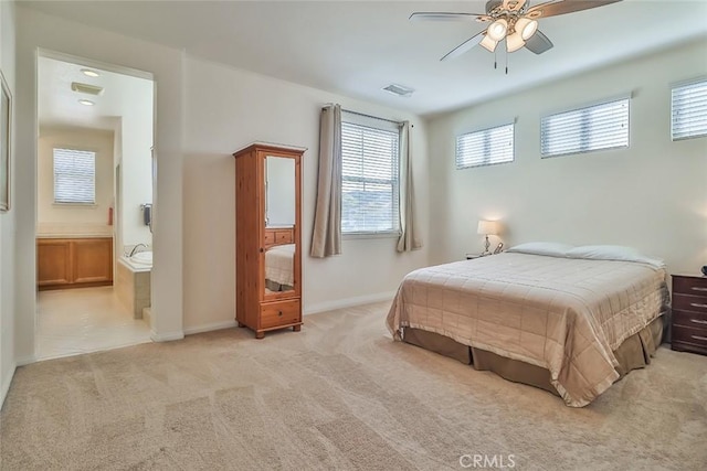 3607 Cascara Ct, Simi Valley, CA 93065 - bedroom featuring light carpet, baseboards, and connected bathroom